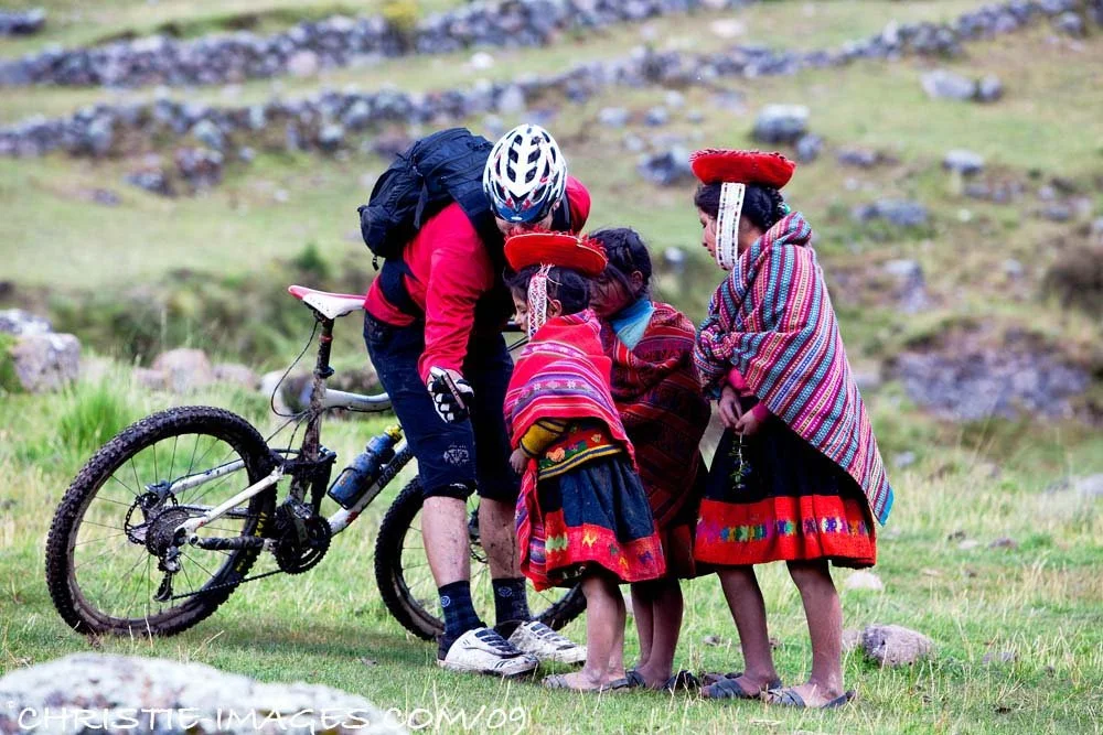 Biker with peru locals