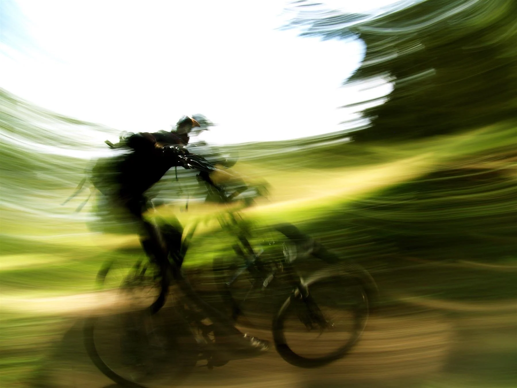 Photo example of utilizing blur to mimic intensity in biking