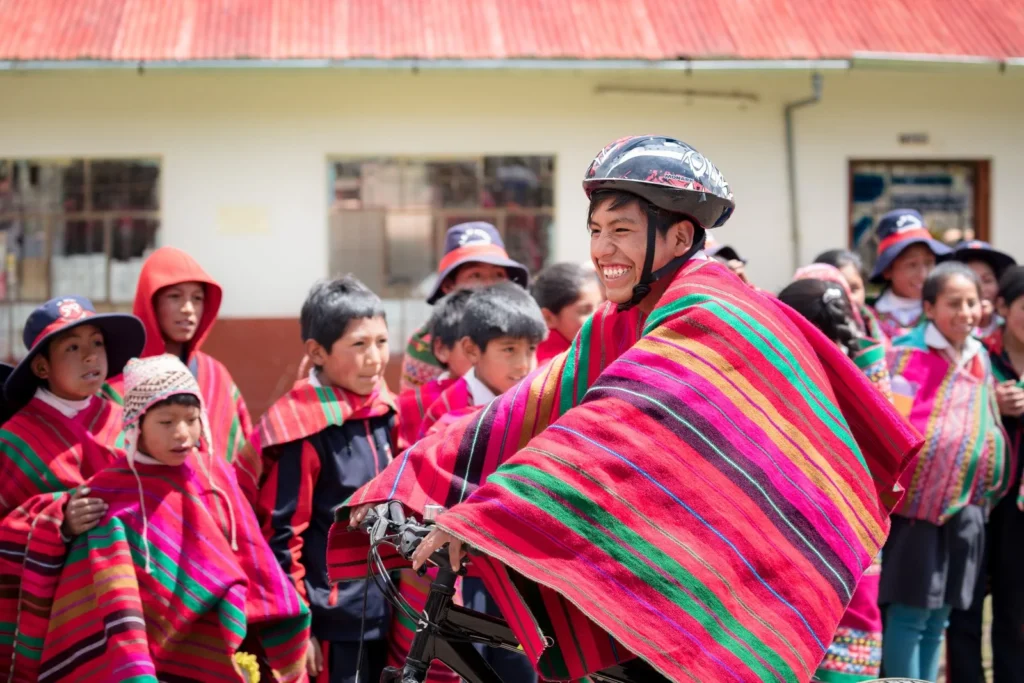 Child wearing biking helmet in Peru
