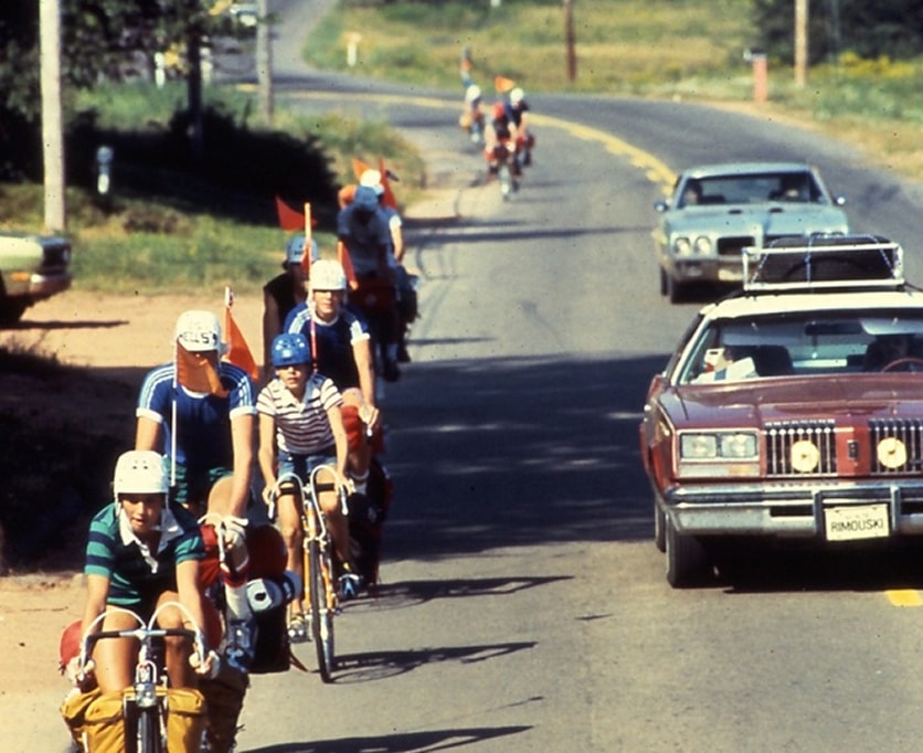 Bikers sharing the road with cars on the street