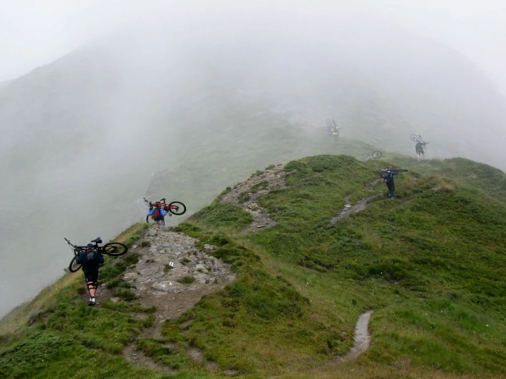The dreaded hike-a-bike, a common scenario in the Alps or Dolomites on route to the goods. Always worth it.