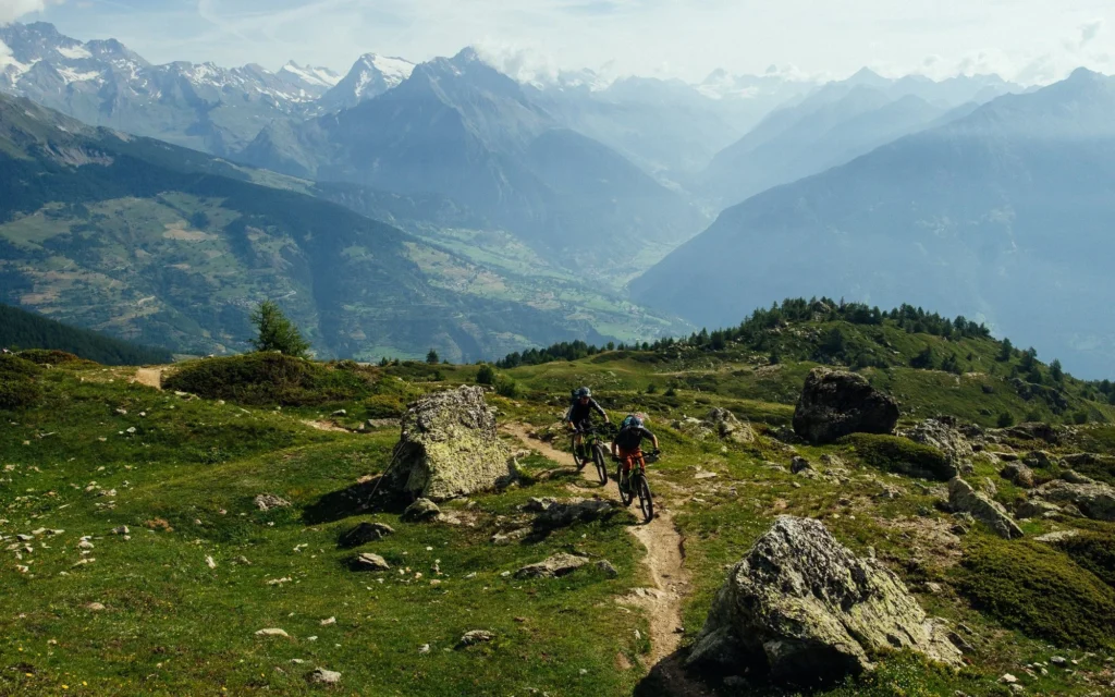 A good view of part of yesterday’s ride: the col on the horizon at around 11:00, hidden beyond it, the Swiss / Italian border. This photo, enjoying the amazing Aosta Valley.