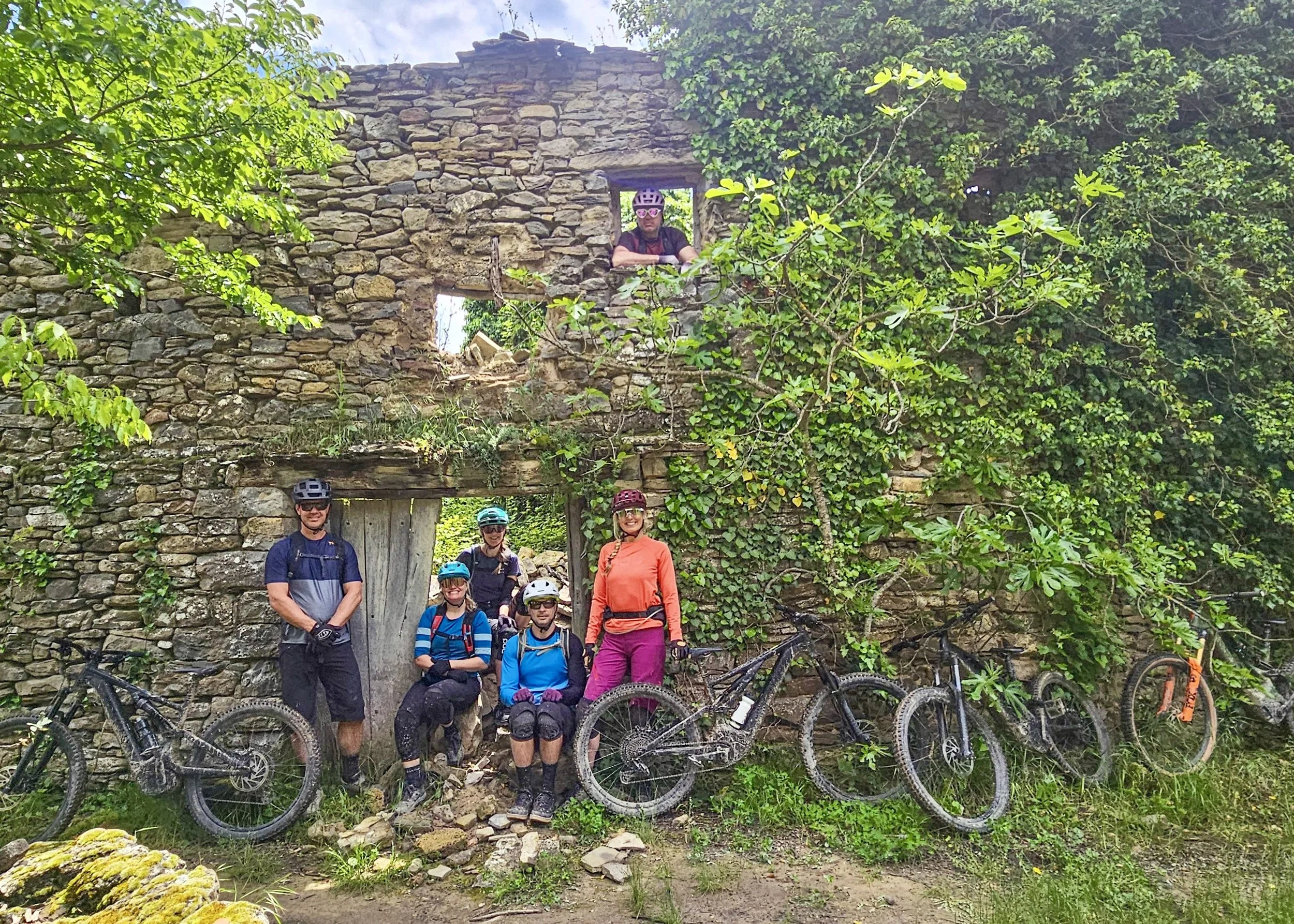 Bikers posing in front of history Spain ruins