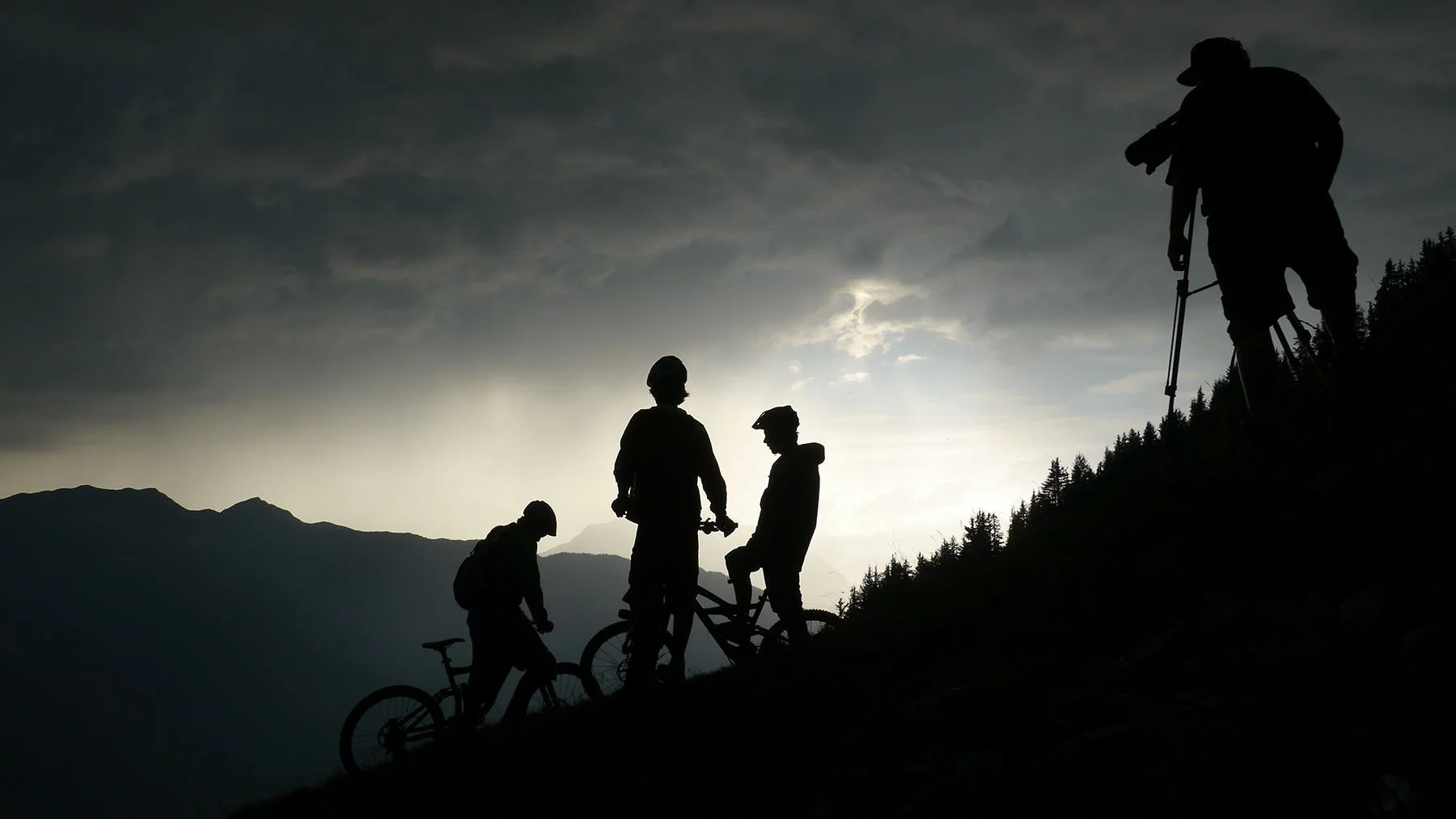 silhouette of bikers
