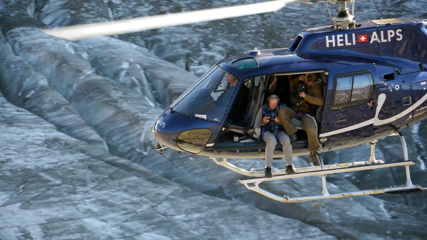 Bikers on a helicopter taking photos