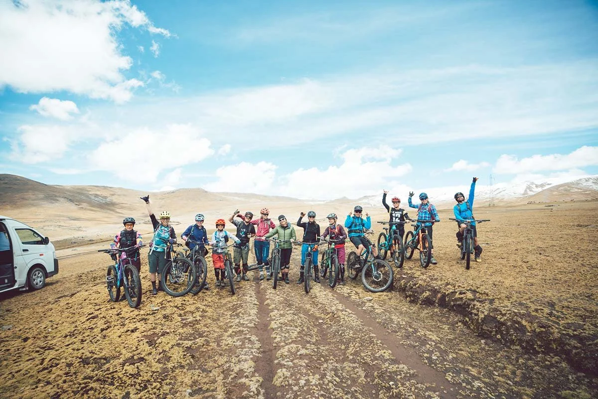 Group photo of a guided mountain bike tour