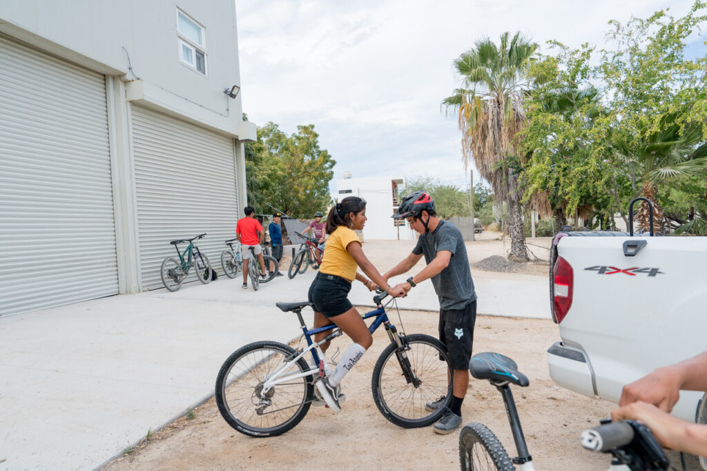 Coach working with a female rider in Mexico. 