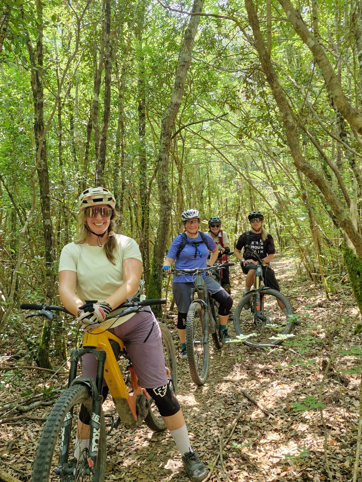 Riders in the forest in Tuscany