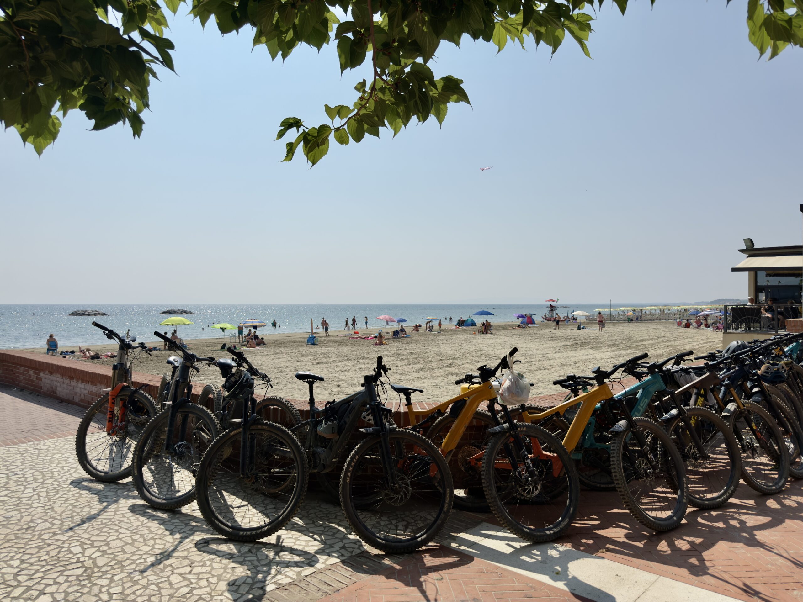Bikes lined up on the beach in Tuscany