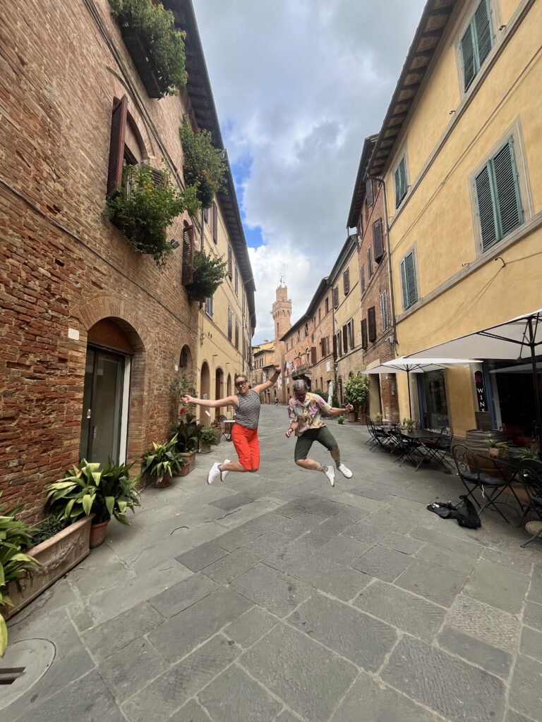 2 women jumping in Florence